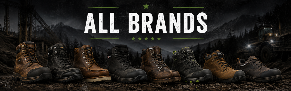 A lineup of various outdoor boots and hiking shoes in brown, black, and tan tones against a dark, misty mountain forest background.