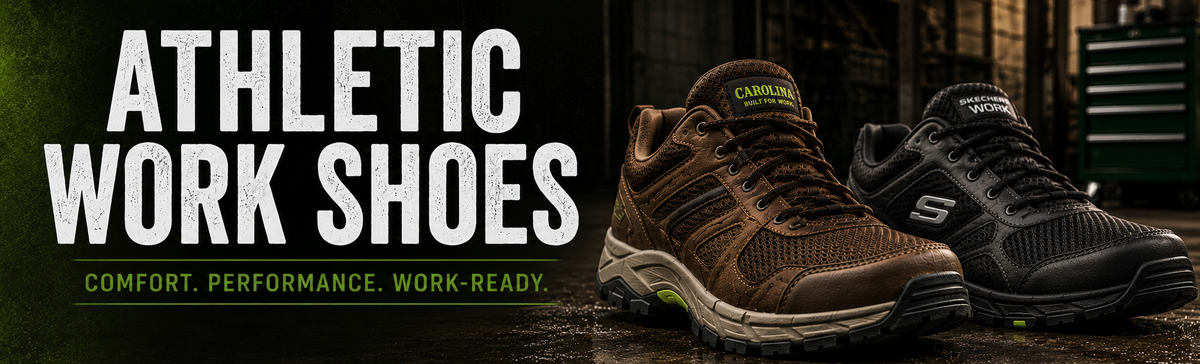 Two athletic work shoes displayed on a wet industrial workshop floor.