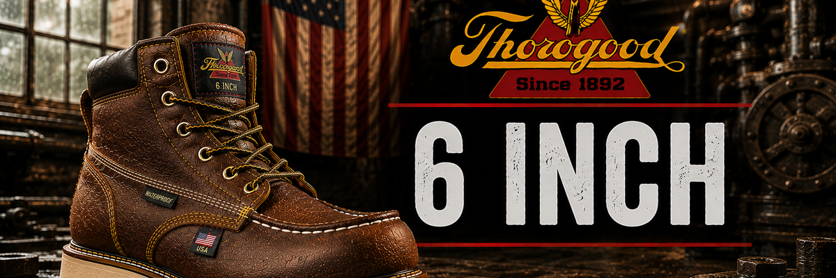 A brown leather 6-inch work boot by Thorogood, displayed in a rustic industrial setting with an American flag and metal pipes in the background.